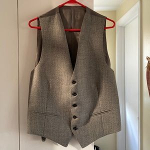 BRAND NEW! Grey Vest size M. It’s beautiful.